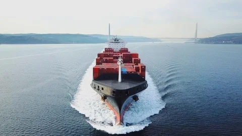 Low level track towards and over container ship. Aerial container ship from nose Video stock 102866267