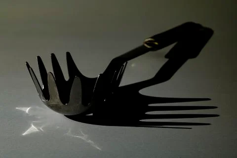 Low light kitchen utensil on a table. Stock Photos