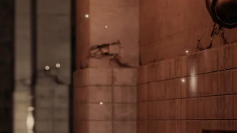 Low light setting with a textured wall and floating dust in the air Stock Footage 343507176