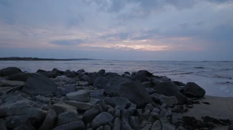 Low Light Wide Angle Ocean Rocks pan Stock Footage 37347576