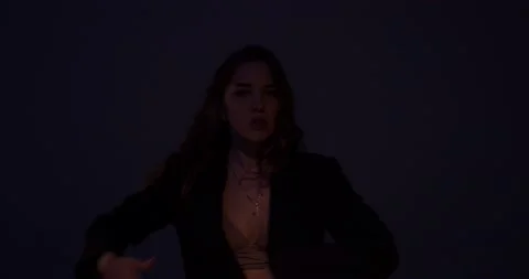 Low lighting dancing show, young woman is dancing in the dark, professional, 4k Stock Footage 147732090