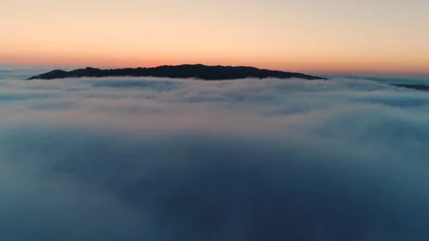 Low Lying Clouds Aerial Stock Footage 77409822