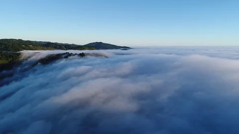 Low Lying Clouds Aerial Stock Footage 77585342