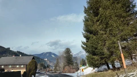 Low Motion Cinematic Passenger View of Snowy Urban Streets Stock Footage 328695062