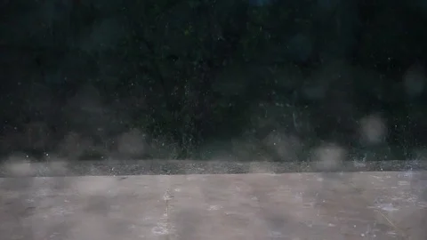 Low motion rain drops on the floor Stock Footage 92094530