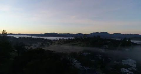 Low Mountain Flyover at Dawn Stockbeeldmateriaal 83829540