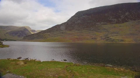 Low Mountains By Lake Видео 75545643