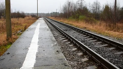 Low narrow platform of a small station Stock Footage 119575582