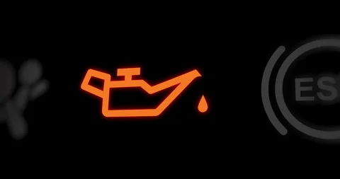 Low oil pressure warning light of car dashboard, oil funnel icon indicator Stock Footage 280301919