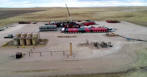Low orbital flight over a natural gas fracking site in Eastern Colorado. Stock Footage 167396517