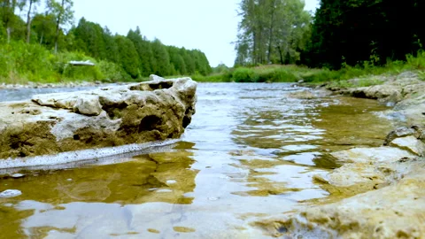 Low Over River Flowing By Limestone Sculpted Rock And The Forest Valley Vista Stock Footage 200340271