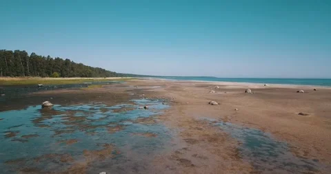 A low-pass with a drone camera along the coastline Stock Footage 146701424
