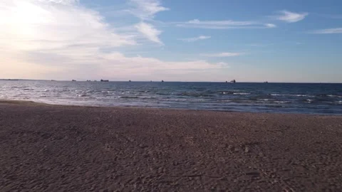 Low pass over beach, Lake Ontario with boats Stock Footage 255094939