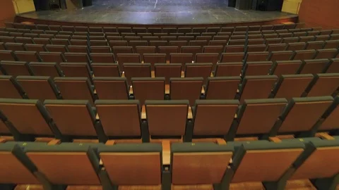 Low pass over theater seats and enter into the stage. Stock Footage 87992084