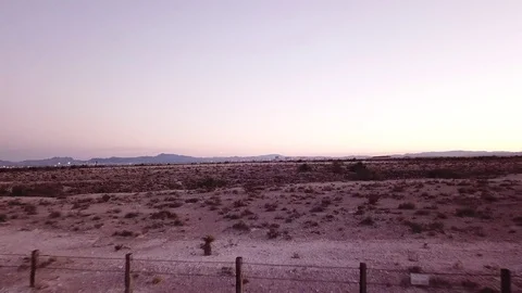Low passover of Nevada desolate desert just outside of Las Vegas Stock Footage 81575046