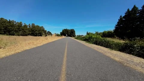 Low perspective over yellow line on bike trail Stock-Footage 282744808