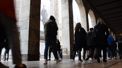 Low perspective of shoppers at a gallery Corso Vittorio Emanuele ii near Duomo Stock Footage 98738101