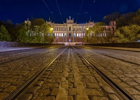 Low perspective symmetrical view over a tram track with popular Munich Stock Photos