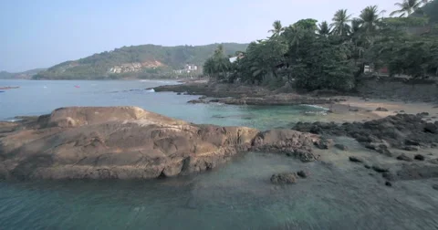 Low Pullback Drone Shot Over Rocks At Kalim in Patong Bay Phuket Thailand 스톡 동영상 63249420