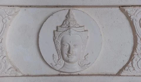 Low relief of thai style deva Stock Photos