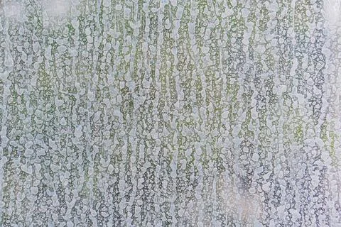 A low resolution, pixelated image with an abstract pattern in muted colors gr Foto stock