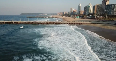 Low Reverse Aerial North Beach Durban Stock Footage 100424196