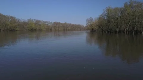 Low river aerial skimming the surface Stock Footage 108219242