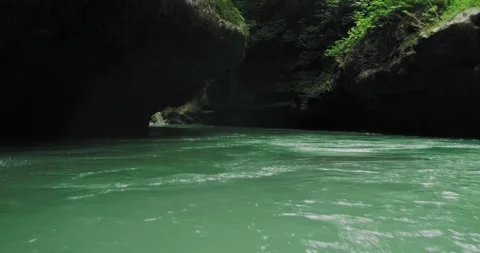 Low River Flow with Rocks and Clear Water Aerial Shot Stock Footage 332488865