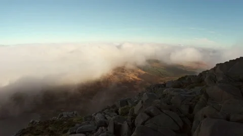 Low rolling fog and cloud over the Welsh countryside 動画素材 203765402