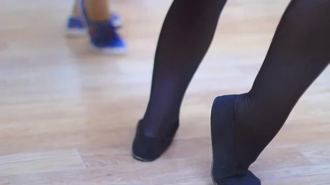 Low section of dancers practicing rehearsal room Stock Footage 73562189