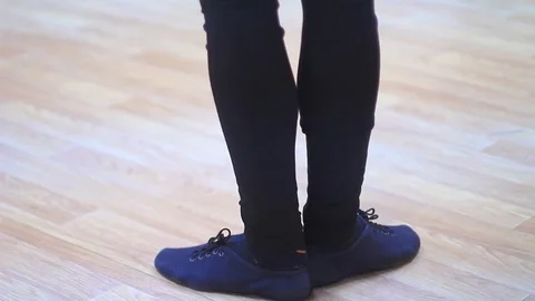 Low section of dancers practicing rehearsal room Video stock 73562204