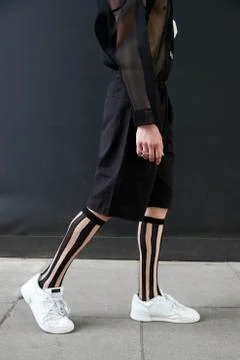 Low section of a man in black culottes and knee high socks Stock Photos