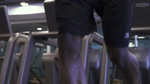 Low section of a man exercising on a treadmill, slow motion, close-up Stock-Footage 164865460