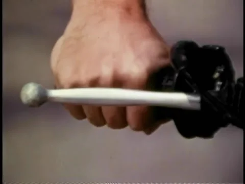 Low section of man kickstarting his motorcycle Stock Footage 260255289