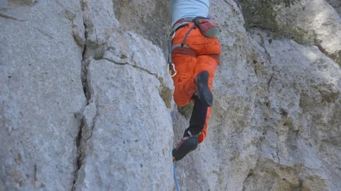 Low section of mountaineer climbing mountain Stock Footage 89971852