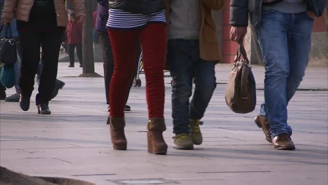 Low section of people strolling on the street Stockbeeldmateriaal 88545328