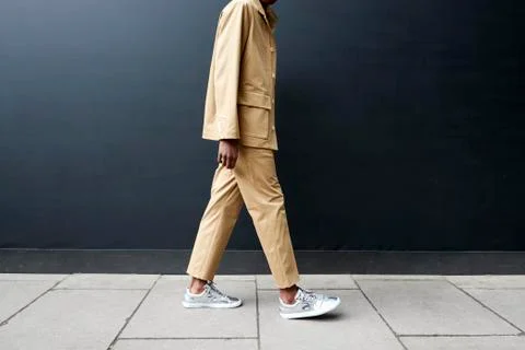 Low section side view of man in safari style suit Stock Photos