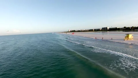 Low Shore Flying FPV - Drone - Siesta Key, Sarasota, FL Stock Footage 202052280
