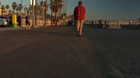 Low Shot of People on the Beach Stock Footage 47008998