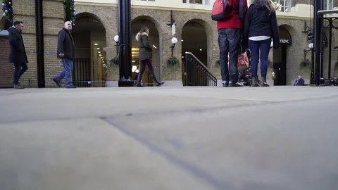 Low Shot of People Passing By Timelapse Stock Footage