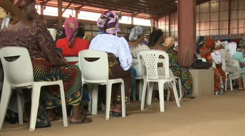 Low shot seated congregation, Nigerian mega church Stock Footage 38476404