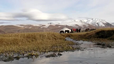 Low Shot of Small Stream and Yurt in Background, Western Mongolia Stock Footage 234279767