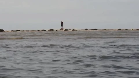 Low shot of waves on the kartini beach, rembang, central java on September Stock Footage 214638916