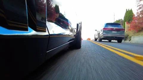 Low Side Angle Driving Footage Around Hayden Lake Stock Footage 324596865