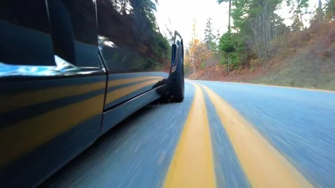 Low Side Angle Driving Footage Around Hayden Lake Stock Footage 324600589