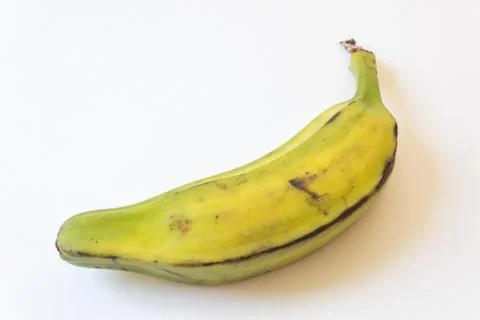 Low side view of half ripe Burro banana Stock Photos