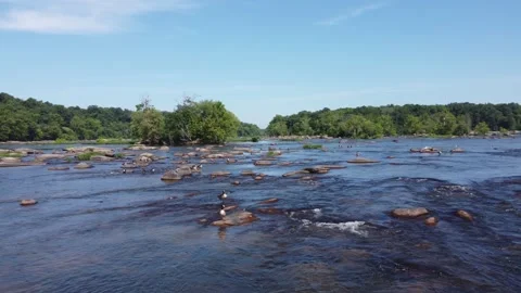 Low Slow Rotating Tracking Shot Over Gentle River With Geese Stock Footage 161441446