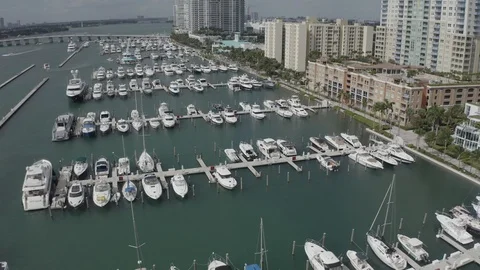 Low span back over white yachts on a pier Stock Footage 120270016