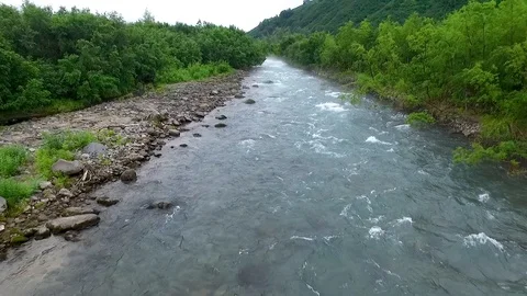 Low span over the mountain river on the Kamchatka  Video stock 109072098