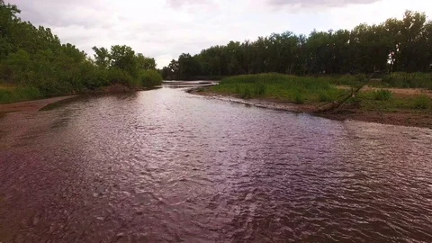 Low Spin Over River Color Corrected Stock Footage 98847109